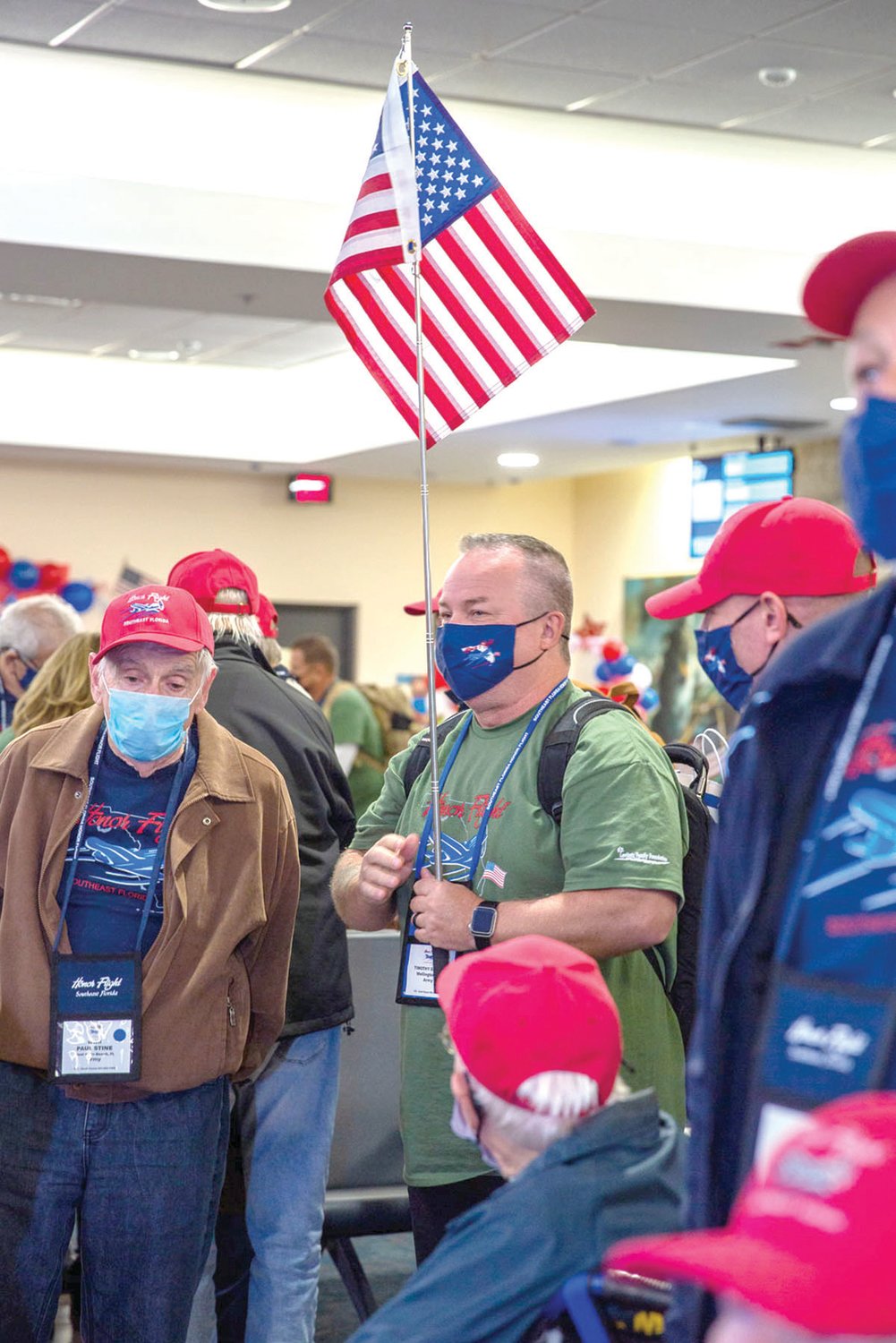 Veterans waiting to board the Honor Flight plane in November 2021.